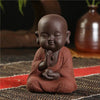 Statue bouddha poterie prière